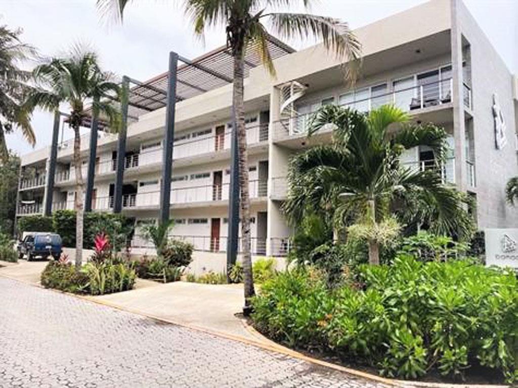 Playacar Condo: Ground Floor Living with Pool & Jacuzzi Access
